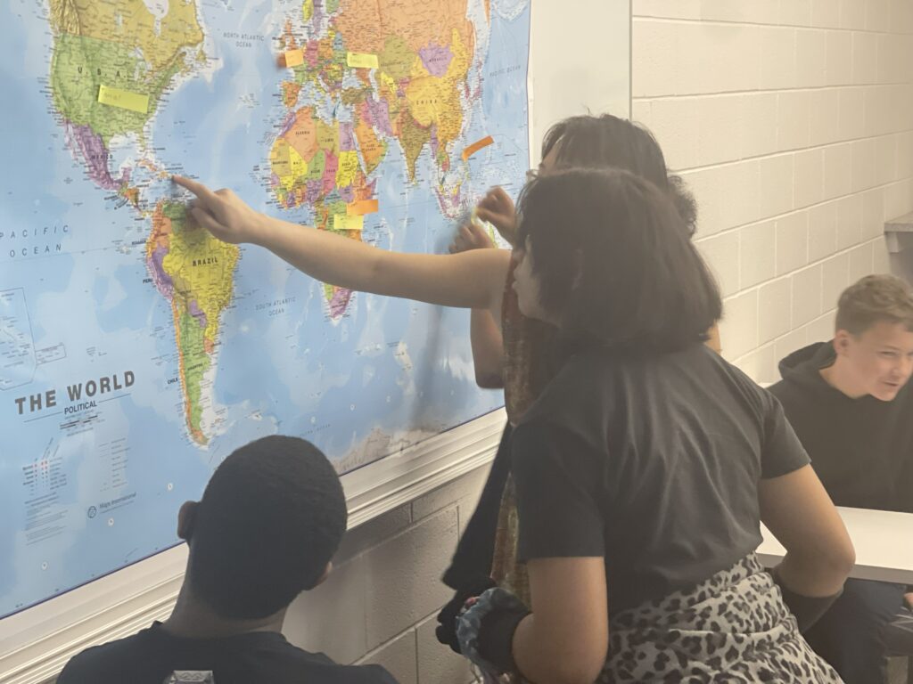 Akron students marking their family origins during Global Ties Akron’s global education workshop.
