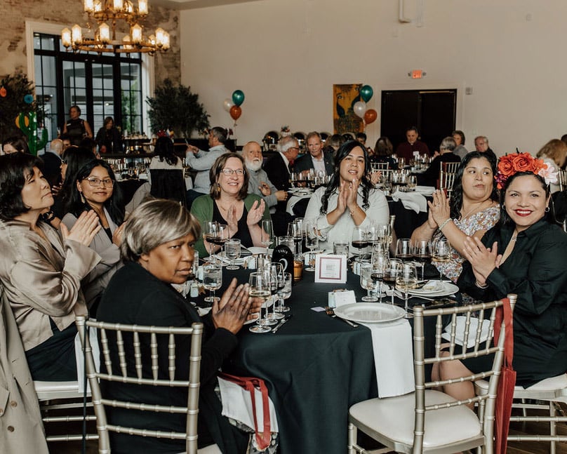 Group of volunteers supporting international visitors and demonstrating the meaning of Global Ties.