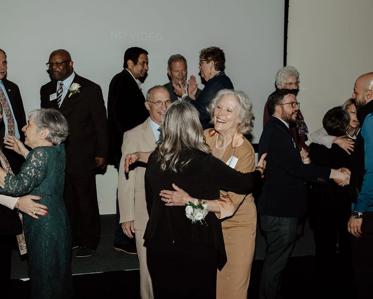 Community leaders gathering at Passport To Wine and Dine networking event for Akron’s business professionals.