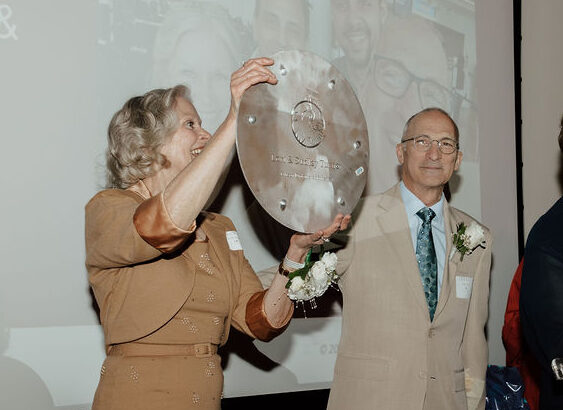 Award ceremony honoring leaders advancing global and educational initiatives in Akron at the Passport To Wine And Dine 2025 event.
