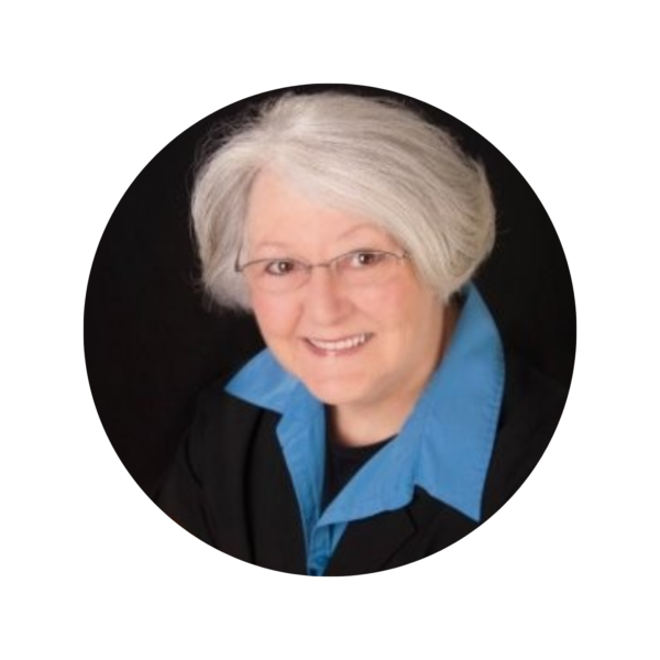 Professional headshot of business consultant Norma Rist, smiling, representing local corporate sponsorship for Global Ties Akron.